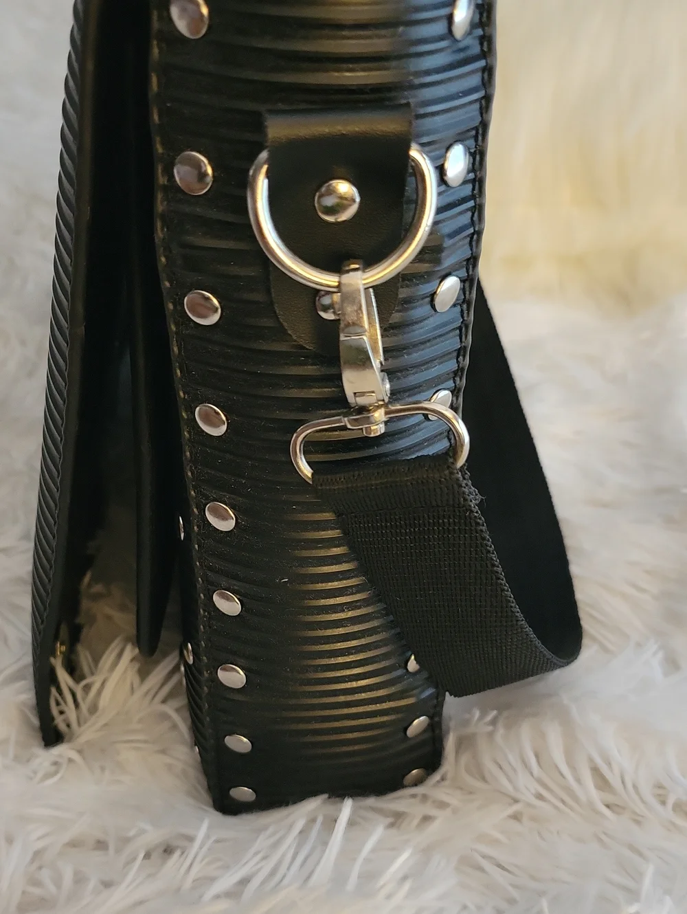 JOEWELL Black Ribbed Crossbody Bag There Is A Cut On Each Side Of The Flap.